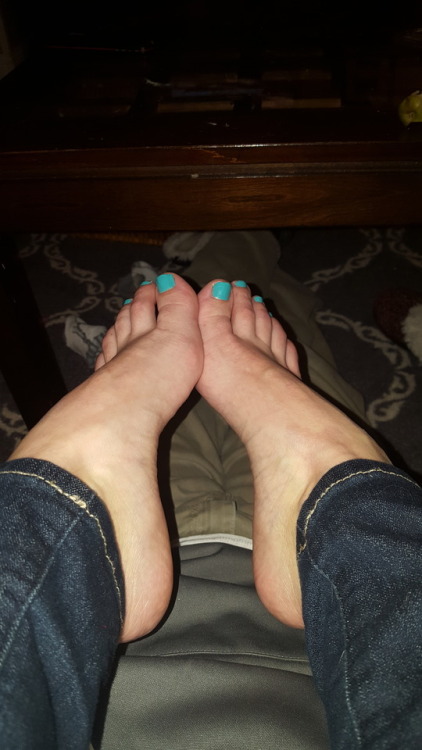 my pretty wife&rsquo;s sexy arches and teal toes getting a massage in my lap.please comment