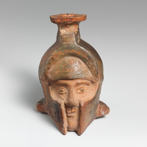 ancientpeoples:Aryballos (perfume flask) in the shape of a helmeted head6th Century BCArchaic Greek(
