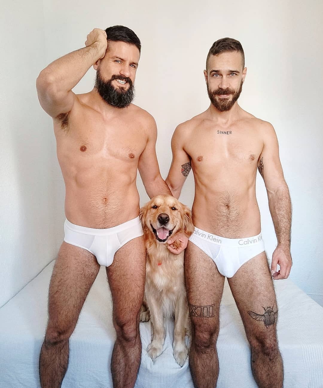 beardedhairyscruffhunks:  @twoguysonedog, because we love❤ to love❤🐕. #gaycouple