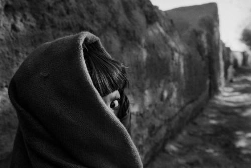 1st image: A mother and daughter returning home from work in the fields, Badakhshan Province, 2004. 