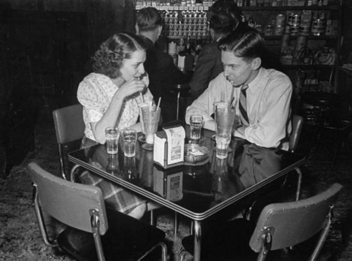 fuckyeahvintage-retro:  Boy and girl at soda shop. Indiana, 1941 © Bernard Hoffman