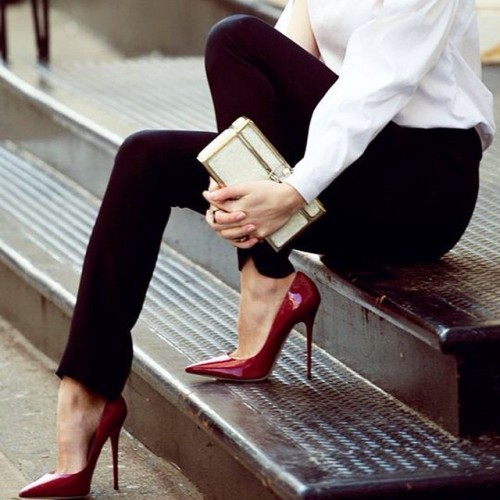 Standard in every business woman’s closet- white shirt, black pants, and a killer pair of red 