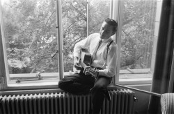 Johnny Cash, sitting on a window sill - September, 1959.A Tanner for the Daily Herald