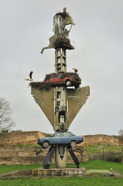 ianbrooks:  Totem by Wolf Vostell Located at the Vostell Museum in Malpartida de Cáceres, Spain, Wolf’s symbolic totem pole combines the holy powers of technology and transportation (and birds, apparently… definitely the triumvirate).  Photo 1: evelivesey