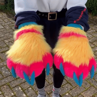 pansexual pride flag themed paws. the person wearing wiggles their fingers then claps
