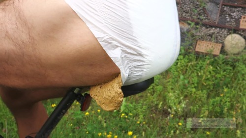 femboydl: pooping diaper outdoor - diaper couldn’d hold it when sitting on the bike… mo