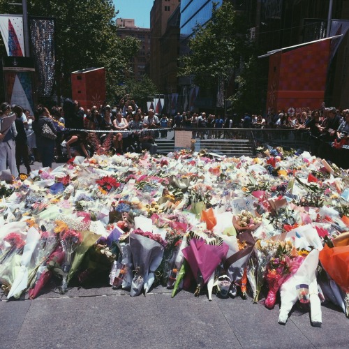 poutful: howlsmovingcastle: The Sydney siege memorial. Flower shops are sold out for blocks in every