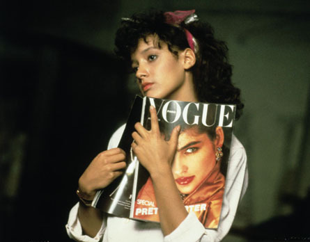 voguefashion: Jennifer Beals in Flashdance (1983), holding the August 1982 issue of Vogue Paris with