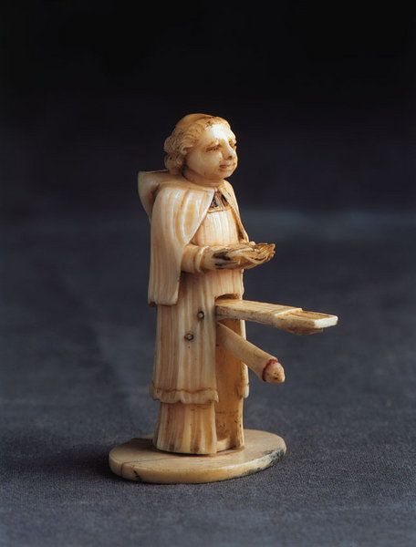 XXX An amusing erotic ivory carving of a monk photo