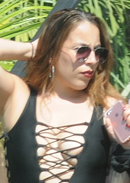 Yep, her areola is peeking out.