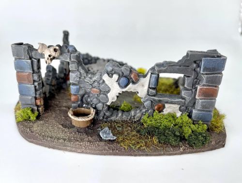 Some cute little ruins from Warlord Games, dolled up with some old school Warhammer Empire bits.