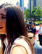 5harmonism:  Lauren climbing on a wall to greet fans and take pictures with them