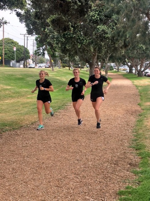 Aggie women getting in some pre-meet miles earlier this year prior to the Mt. SAC Relays on the wood