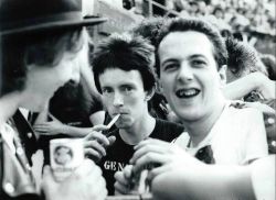 theunderestimator-2:  Rat Scabies of The Damned, Topper Headon &amp; Joe Strummer of The Clash as documented by Patrick Fontaine at Mont de Marsan ‘77 festival. (via) 