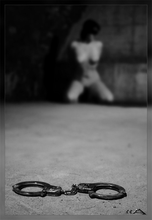 lairofthewolf:  Handcuffs, she needed them — and much more. 