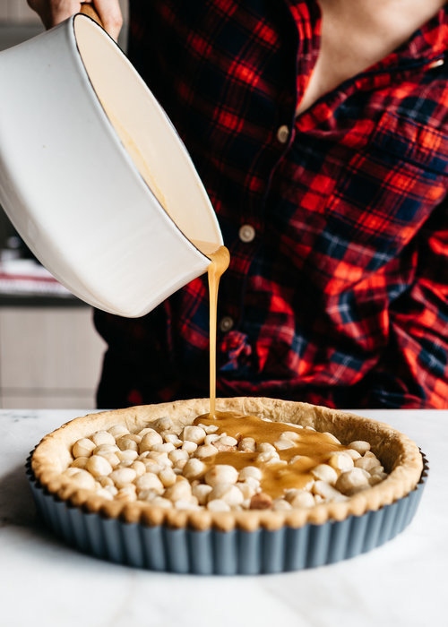 sweetoothgirl:    CHOCOLATE-CARAMEL MACADAMIA NUT TART    Uh&hellip;YES PLEASE!
