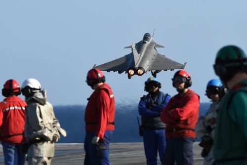 A Marine NationaleRafale fighter aircraft takes off from the French aircraft carrier Charles-de-Gaul