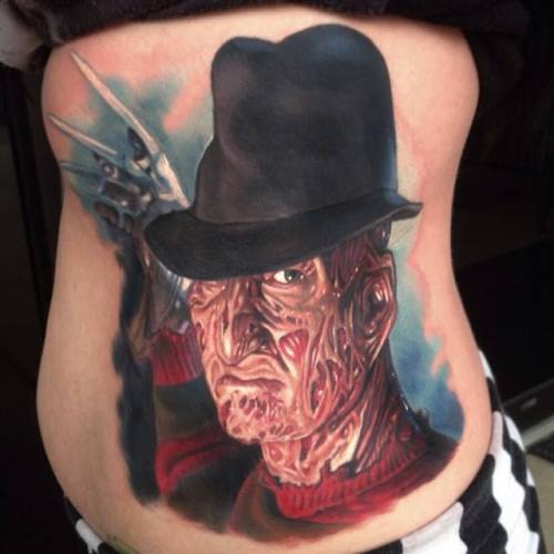 horroroftruant:Insane Horror Movie Themed Tattoo Art by Paul AckerPaul Acker has been tattooing 