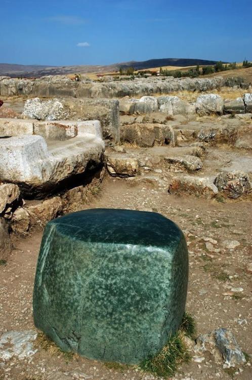 fromthedust:The Green Stone - A massive green cubic rock located in the ruins of Hattusa, capital of the Hittite empire.     Hattusa   is near modern Boğazkale, Turkey - 6th millennium BCE.