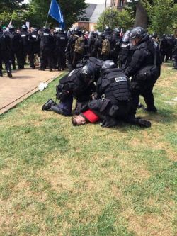 theweirdwideweb:  Richard Spencer getting arrested after being maced in the face by police today in Charlottesville VA