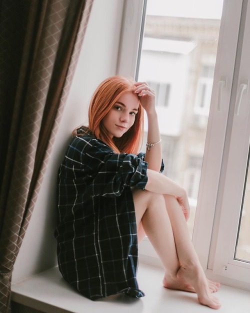 Julia sat at the window wearing only an over-sized flannel shirt that was unbuttoned. Smiling and looking at Mr. Crude she softly said, “Come on…let me do my special project here. I doubt anybody will be looking in my window, but the thought