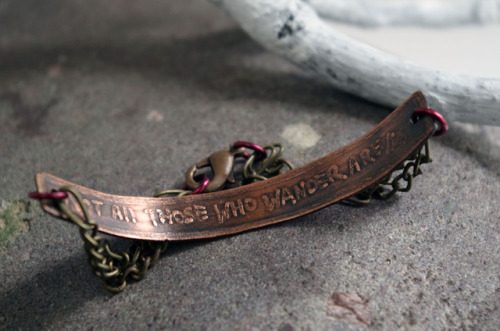 I’m doing a giveaway of this Elvish bracelet over at my (non-Tumblr) blog!The front of the bracelet 