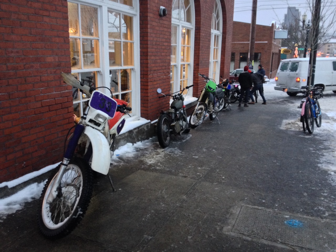 motolady:  The show today was busy as ever despite crazy snow. A few dirtbikes outside