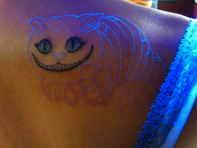 inkessentials:  This is such a cool way to do the Cheshire Cat. Have the fave done
