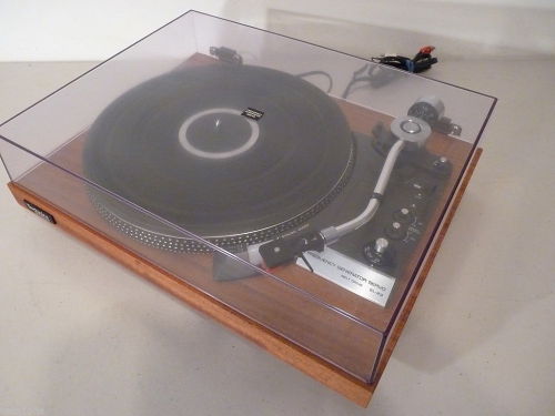 Technics SL-23 - Restored One Of A Kind Auto Return Turntable.   A true classic one of a kind turntable by Technics, model SL-23. The turntable has been restored to better than original condition. The base had the gray vinyl covering removed and real