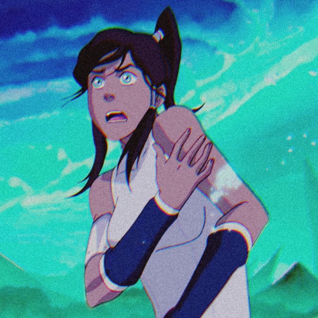 icon of korra from the legend of korra. she is in her regular outfit in the spirit world. she looks to the left in shock and holds her left arm which was just hit. shiny particle effects fall from it