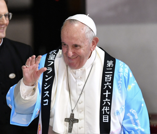 Pope Francis waves to participants during his meeting with youth at St. Mary&rsquo;s Cathedral o