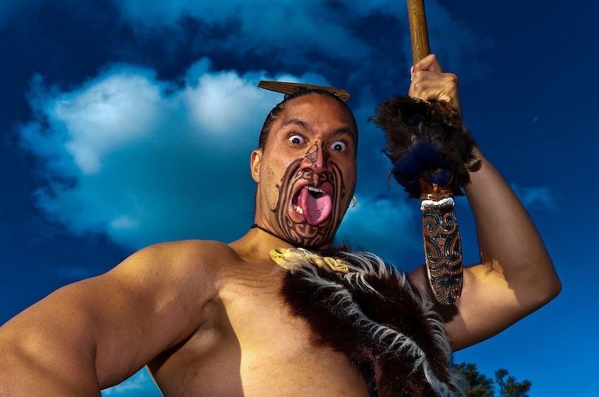 Maori warrior doing a war dance.
