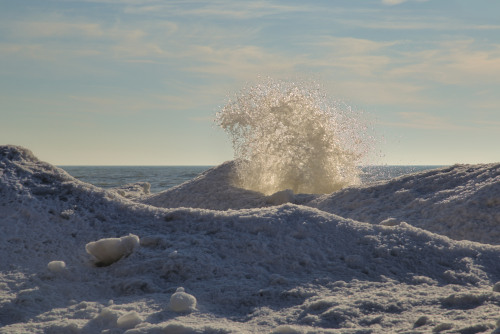 Ice volcano on the Lake. Slush and big chunks of ice being thrown up by the waves built these hills 