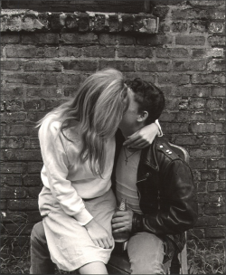 rawcolorado:      Young couple kissing;