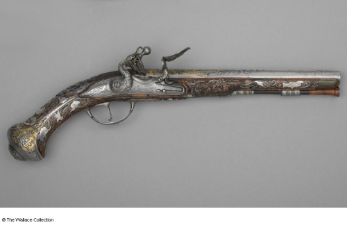 An ornate gold and silver decorated flintlock pistol originating from Dresden, Germany, circa 1730.C