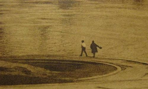 Unknown, Tiny detail of two people walking by the Bolshoy Kamenny Bridge, taken from a large photo o