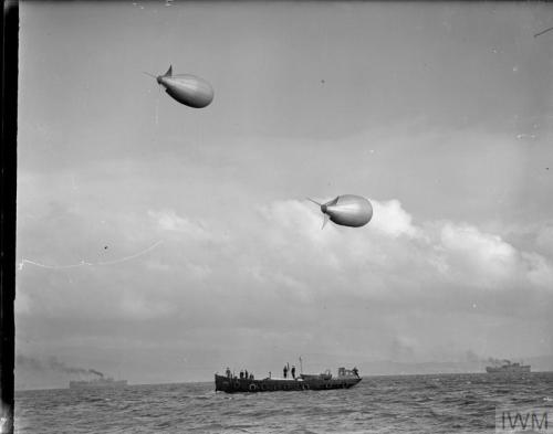 Ratings bring out an inflated barrage balloon, at Greenock or Gourock(Scotland, October 31st, 1941):