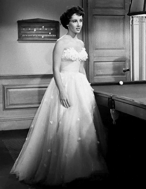ephemeral-elegance:Floral Tulle Dress worn by Elizabeth Taylor as Angela Vickers in A Place in the S