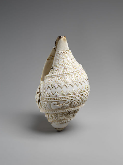 hinducosmos:Carved Conch ShellDate: 11th century or earlier. Pala period. India. H. 6 in. (15.2 cm);