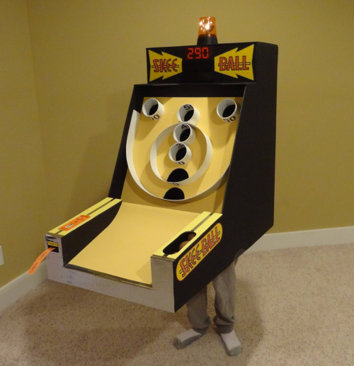 thedeskofdrychris:  queenwhiskey:  tayintheflesh:  pleatedjeans:  via  THE SNACK MACHINE!!!?!  A weapon to surpass metal gear  I could have sworn the UPS one was the costume until I looked down 