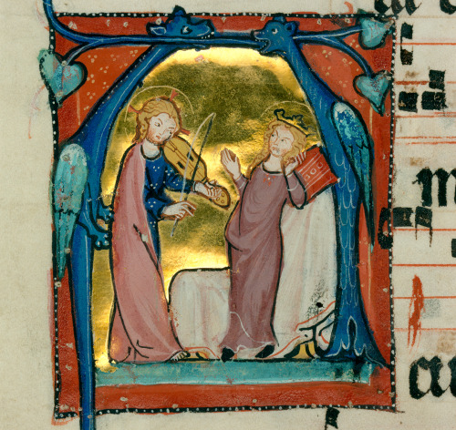 Jesus Christ making music for Saint Agnes under two blue dragonsInitial &lsquo;A&rsquo;, Cistercian 