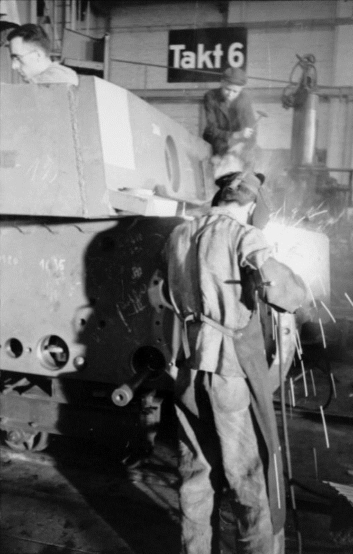 thebeautyandthehorror:  PzKpfw VI Tiger I heavy tanks being built in a factory in