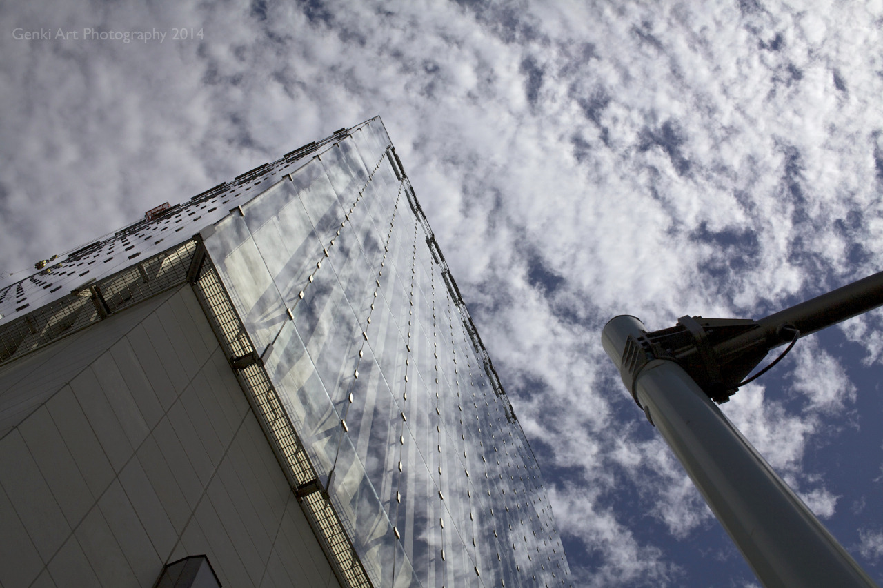 <p><b>Hard reflective geometric surfaces consumed by soft puffy sky – another type of balance</b>.</p>