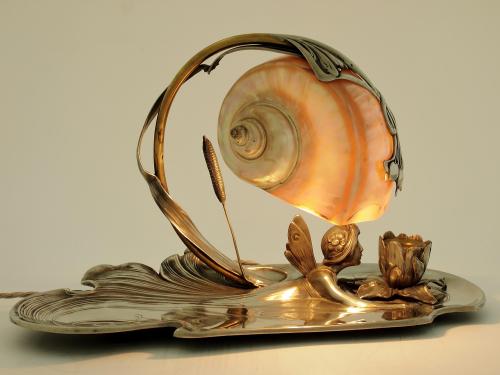 artnouveaustyle: An Art Nouveau silver-plated fairy lamp by Moritz Hacker, circa 1905. From here.