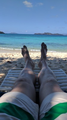 size16whitefeet:  Relaxing on the beach, sand on my toes.  Size 16 US.