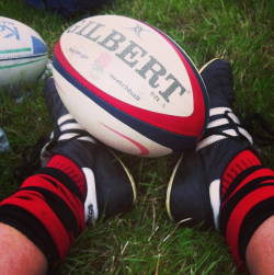 Men in rugby and footy socks