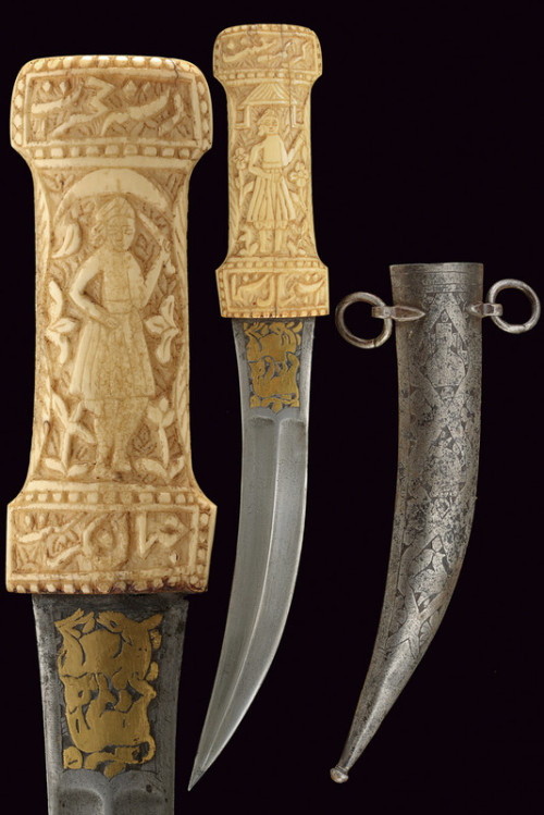 Persian Kandshar with carved ivory hilt, 19th century.from Czerny’s International Auction House