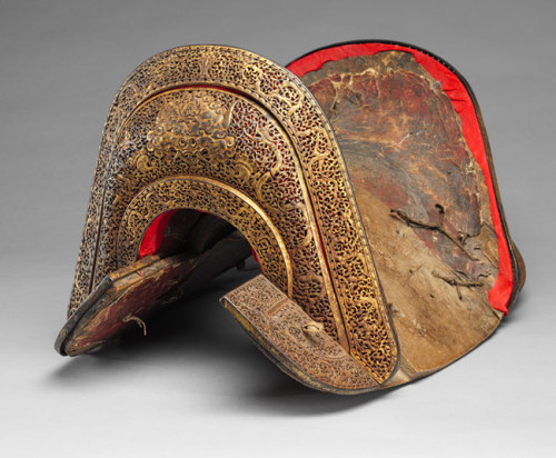 Saddle, 15th centuryTibetanIron, gold, wood, and leather; H. 13 ¾ in. (34.9 cm), L. 23 3/8 in