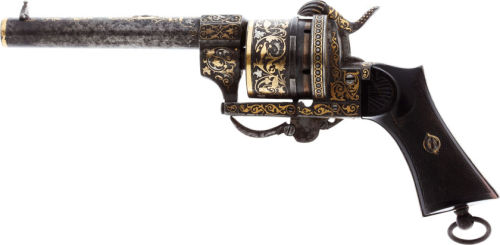  Engraved folding trigger pinfire revolver with gold and silver decorations.  Most likely of Belgian origins, mid 19th century. 