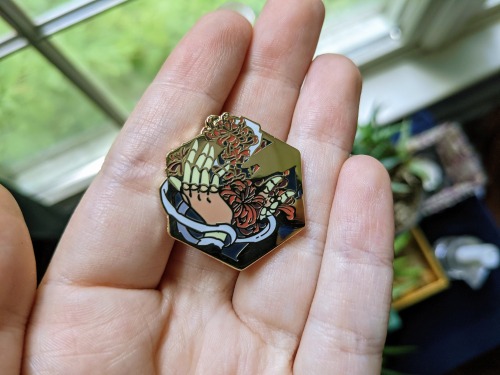 Production Update! Our pins have arrived! ✨ Our last items (foil prints/character cards) are also on